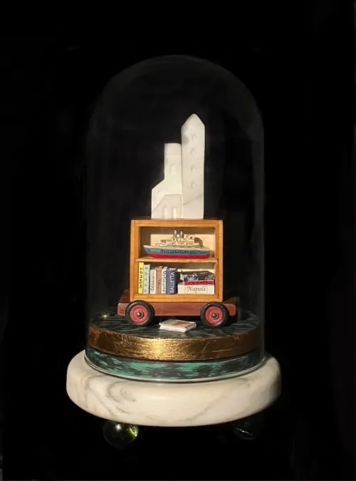 Antonio Balletta The Arrival 25(h) x 14(d)cm (3) Carrara marble, timber, paper, fabric, glass, metal, rubber, gold leaf and polychrome patina $2,900